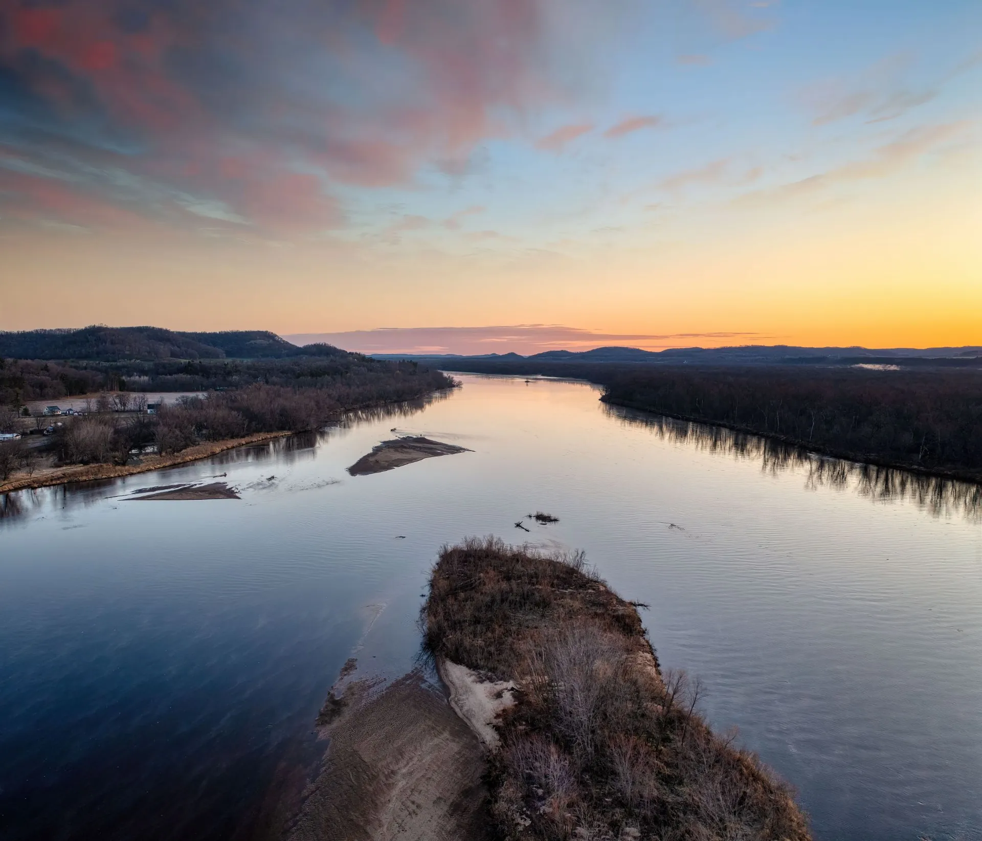Sunset over a wide river valley in the Wisconsin Driftless region